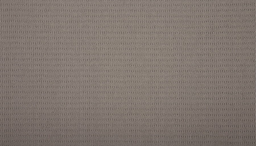 Close-up of Eloquent Vision Family Friendly Carpet in muted beige, showcasing a subtle grid pattern with evenly spaced raised lines—an elegant choice for luxury flooring.
