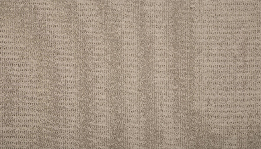 Close-up of the Eloquent Vision Family Friendly Carpet in beige, featuring a soft, evenly woven surface with a subtle horizontal ribbed pattern—perfect for luxury flooring with a refined, uniform look.