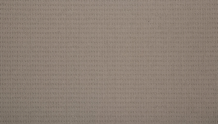 A close-up of the Eloquent Vision Family Friendly Carpet in beige, showing its textured cut and loop pattern with horizontal rows of small, evenly spaced ridges—an ideal choice for luxury flooring.