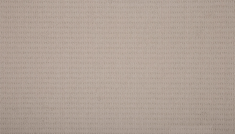 Close-up of Eloquent Vision Family Friendly Carpet in beige, featuring a soft, uniform texture and subtle horizontal ribbed pattern—ideal for creating a luxurious, neutral flooring backdrop.