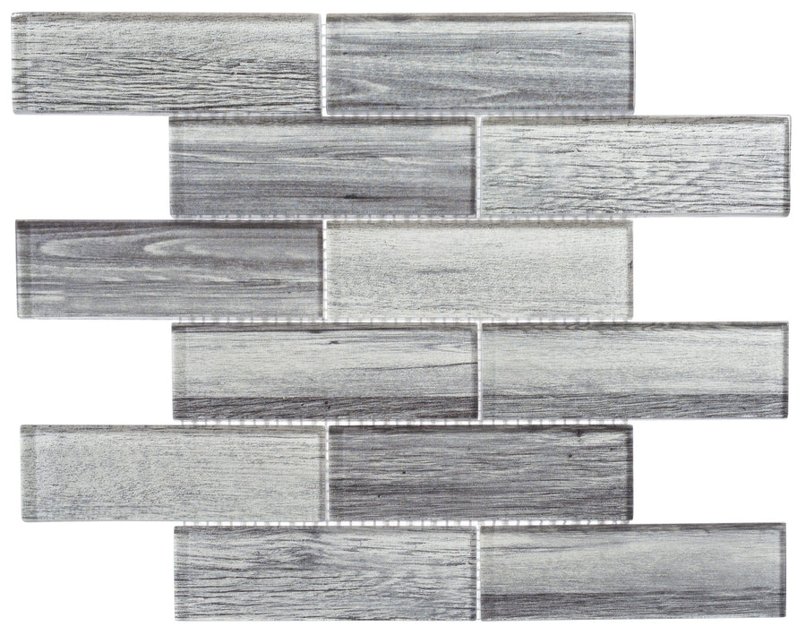 The Westminster Glass Mosaic features rectangular tiles in various gray shades with a wood grain texture, arranged in a staggered brick pattern—ideal for stylish backsplashes or shower tile accents.