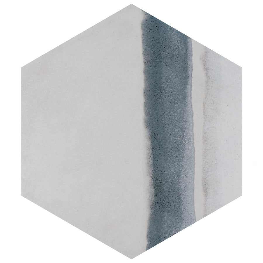 The Rembrandt Hex 7 7/8" x 9" Porcelain Tile is a hexagonal floor tile with a light gray surface and a vertical gradient stripe in blue and dark gray along the right edge.