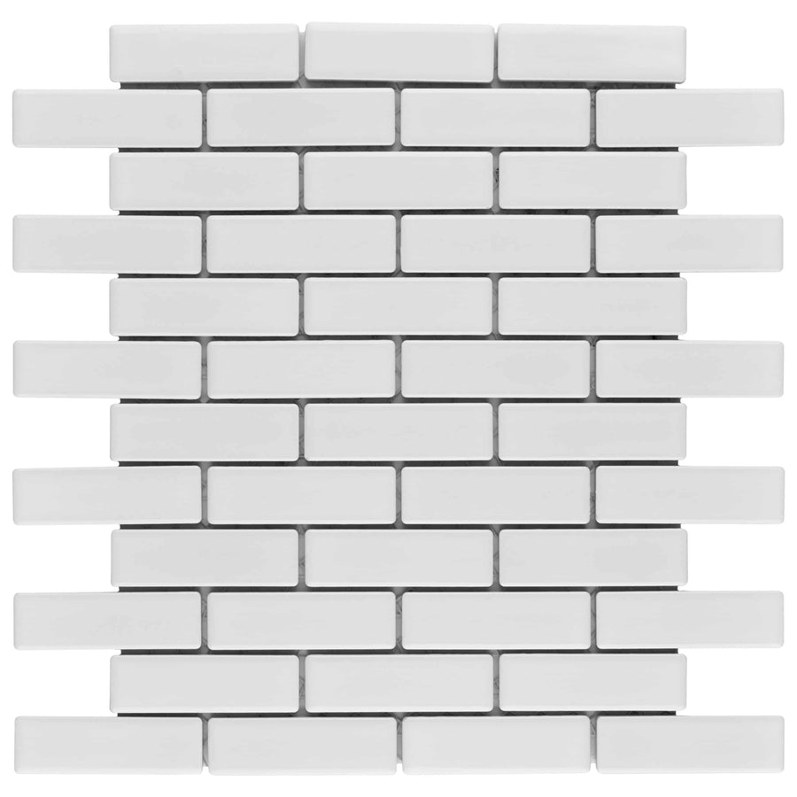 Metro Brick Offset Mosaic Tile features a white porcelain mosaic in a staggered brick pattern, ideal for floors, walls, or as a backsplash. Rectangular tiles are evenly spaced and aligned in horizontal rows for a clean, modern look.