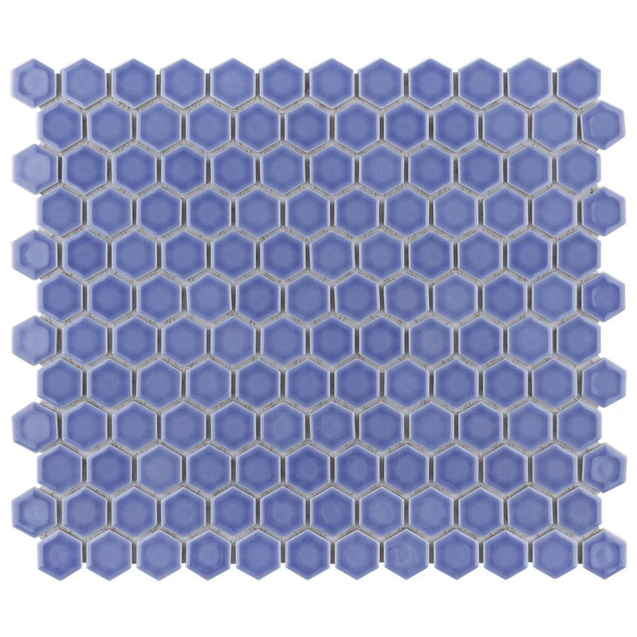 A sheet of Tribeca 1" Hex Glossy Mosaic Tile featuring small, blue, hexagon porcelain pieces in a honeycomb pattern with white grout lines.