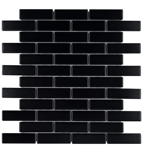 The Metro Brick Offset Mosaic Tile features rectangular black tiles in a staggered brick pattern with white grout, ideal as a backsplash for modern kitchens or bathrooms.