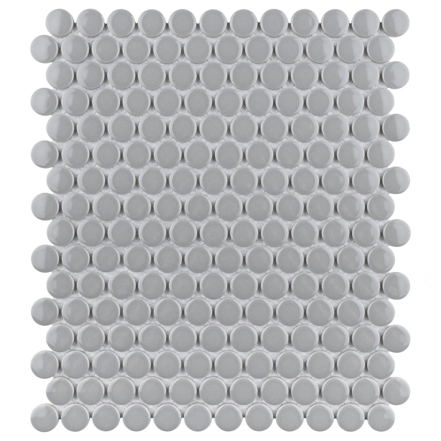 The Metro Penny Round Mosaic Tile features small, round, light gray tiles arranged in a neat, evenly spaced grid for a retro-inspired look, forming a rectangular sheet reminiscent of classic penny round designs.