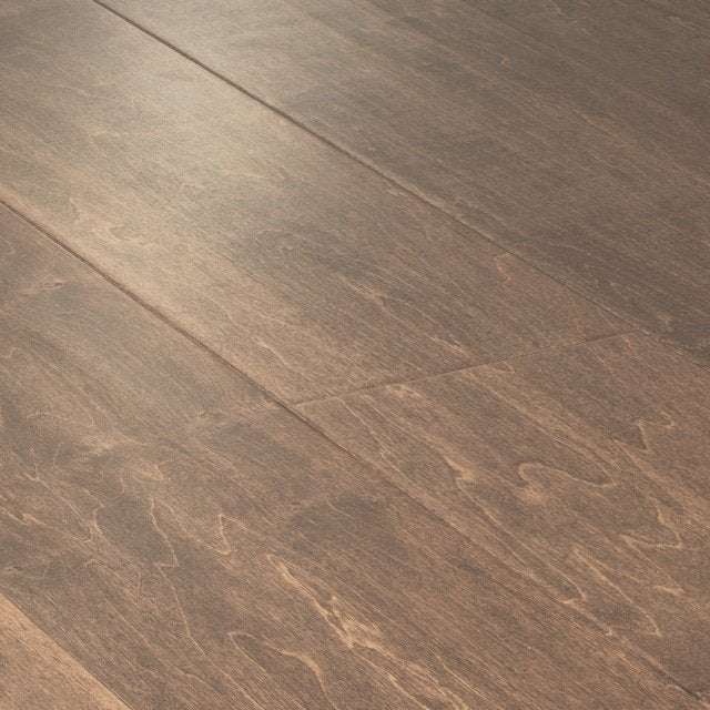 Close-up of Farmhouse Chic 6 1/2" Handscraped Maple Hardwood flooring, featuring a smooth matte finish and subtle wood grain—perfectly suited for a Farmhouse Chic style.