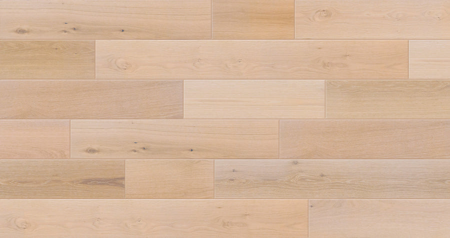 Valor Hall 7 1/2" White Oak Hardwood features light-toned European oak in a staggered layout, highlighting natural grain and knots for rustic elegance.