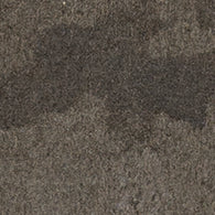 A close-up of Platform 2x8 Porcelain Tile in grey, featuring an aged metal plates texture and a subtle metallic look.