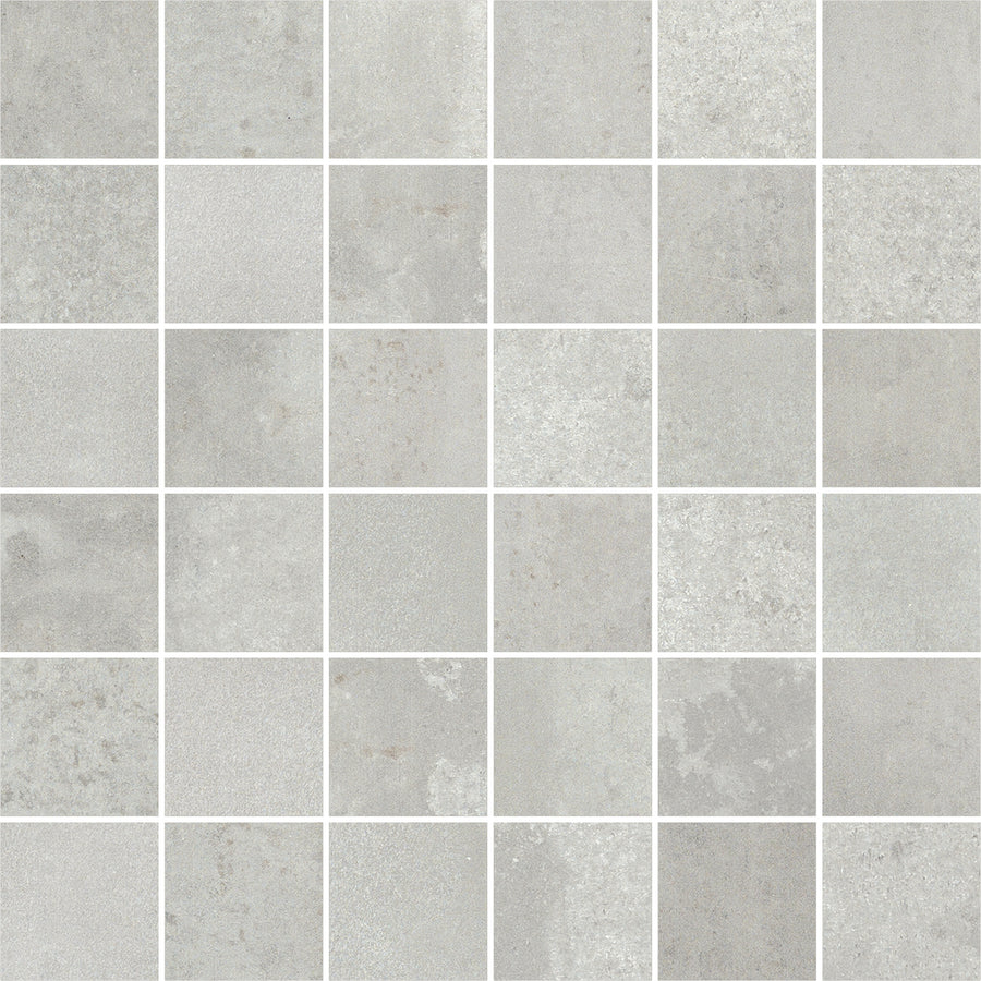 Platform 2x2 Mosaic Tile features light gray square tiles with subtle texture and shading, a metallic finish, and uniform white grout lines, creating a sleek, modern grid pattern.