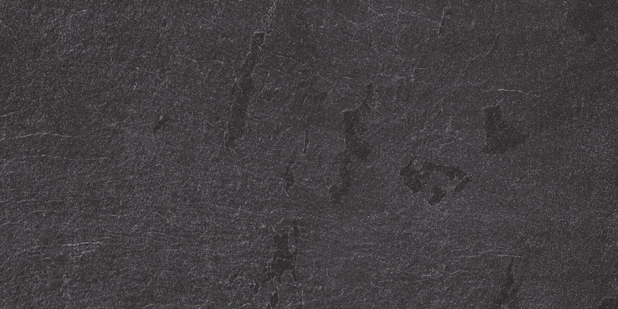 With a dark, textured stone look and subtle natural patterns, Slide 12x24 Porcelain Tile brings a rugged yet refined touch to modern design spaces.