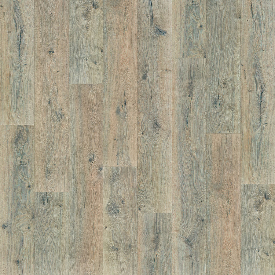 A close-up of Genesis 7.5" Waterproof Laminate shows its staggered wooden plank design, natural grain, knots, and a blend of light brown and grey tones for an authentic hardwood look.