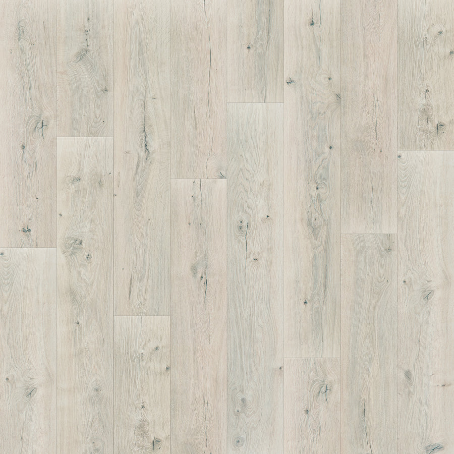 Genesis 7.5" Waterproof Laminate features a light wood tone with natural grain and scattered knots. Its staggered planks offer a clean, modern look and realistic hardwood detail, enhanced by EIR technology.