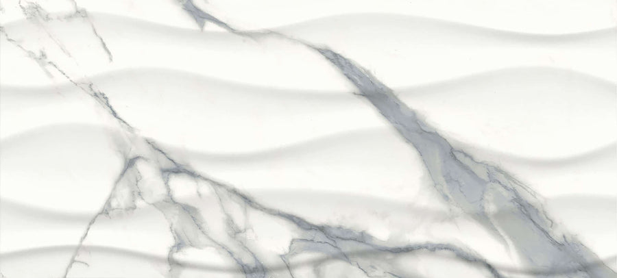 The Glam 10x22 Onda Deco Glossy Porcelain Tile features a white marble look with soft gray veins and a horizontal wavy embossed texture, adding depth and sophistication—perfect for elevating any wall space.