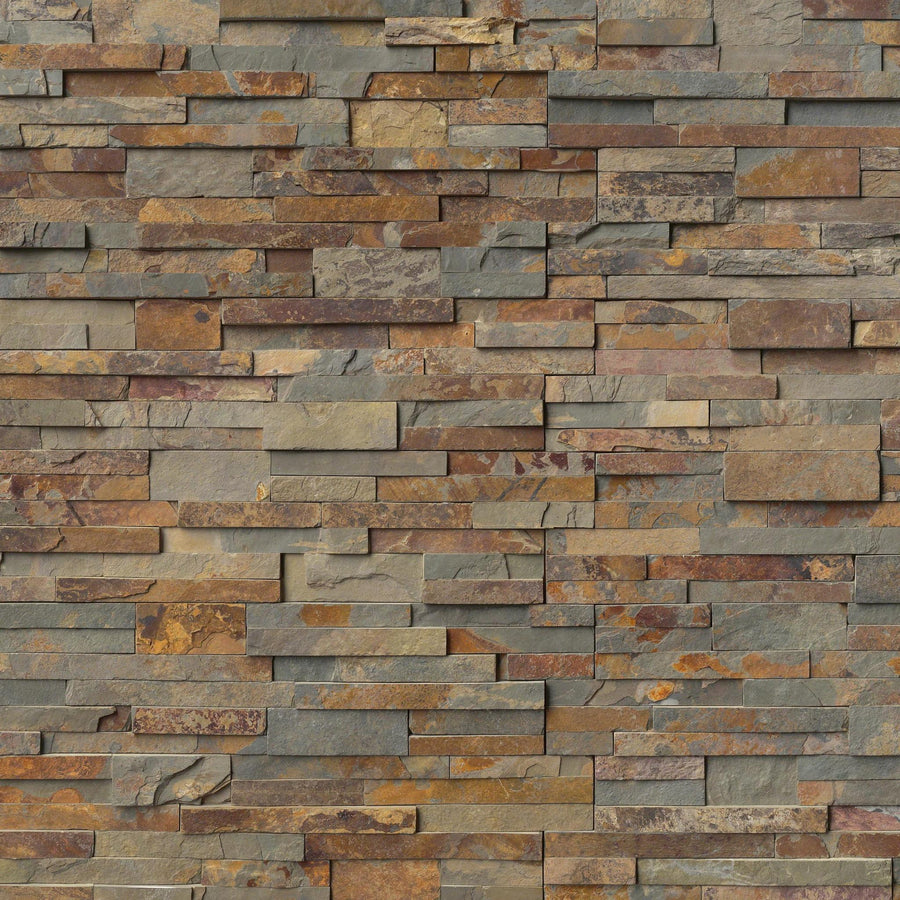 A close-up of a wall featuring Landscape 6x24 Natural Stone Ledger Panels in staggered earth-toned rectangles—browns, grays, and rust hues—for a striking and textured look.