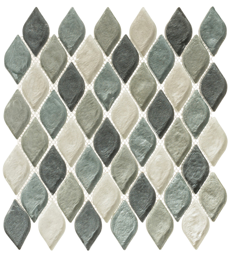 The Aquatica Mosaic Glass Tile features leaf-shaped tiles in a diamond pattern with gray, blue-green, and off-white tones, arranged in neat rows on a white mesh backing.