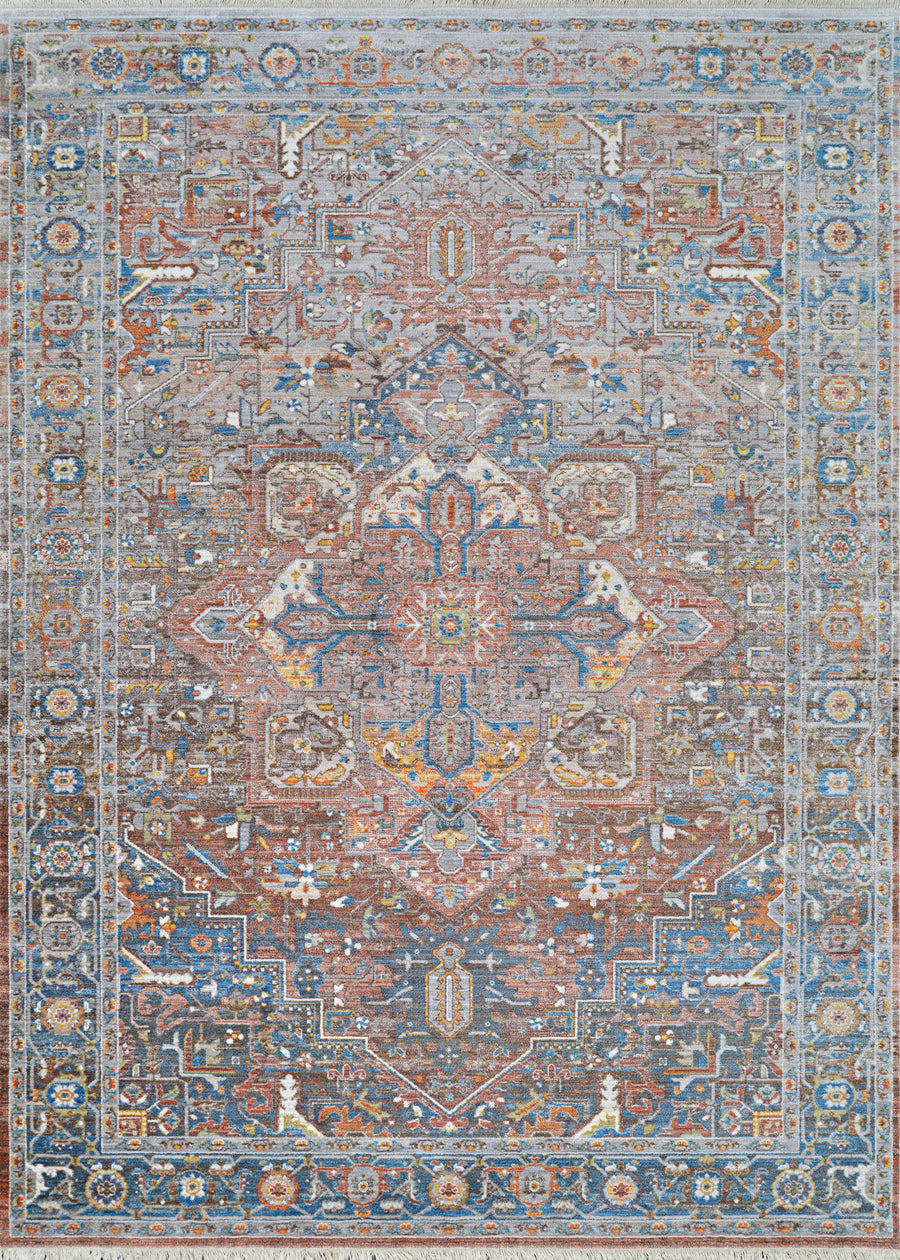 The Halli Kerman Area Rug showcases an intricate geometric pattern with floral and star motifs in blue, rust, gold, and ivory tones, accented by decorative borders for a richly detailed Persian-inspired design at an affordable price.