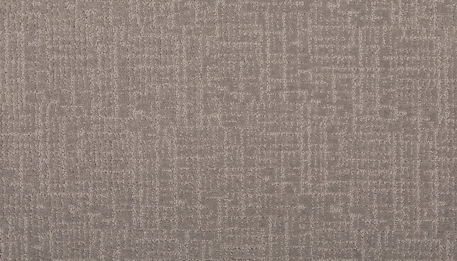 Close-up of Delicate Features Family Friendly Carpet in beige, featuring a subtle geometric pattern with intersecting lines and rectangles for a modern look, plus outstanding stain resistance.