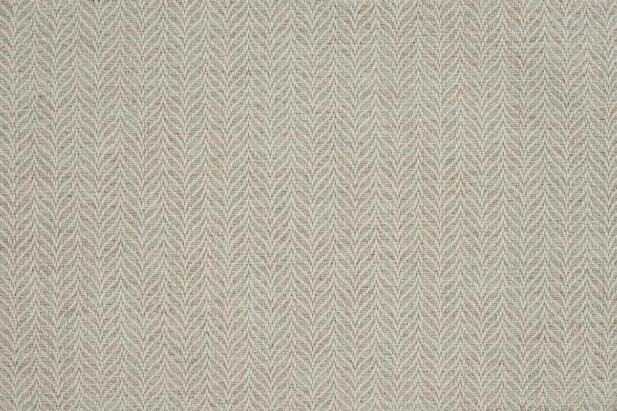 Close-up of Island Wave On Trend Carpet, featuring a flatweave texture with a repeating chevron or herringbone pattern in beige and light gray tones for a stylish, symmetrical look.