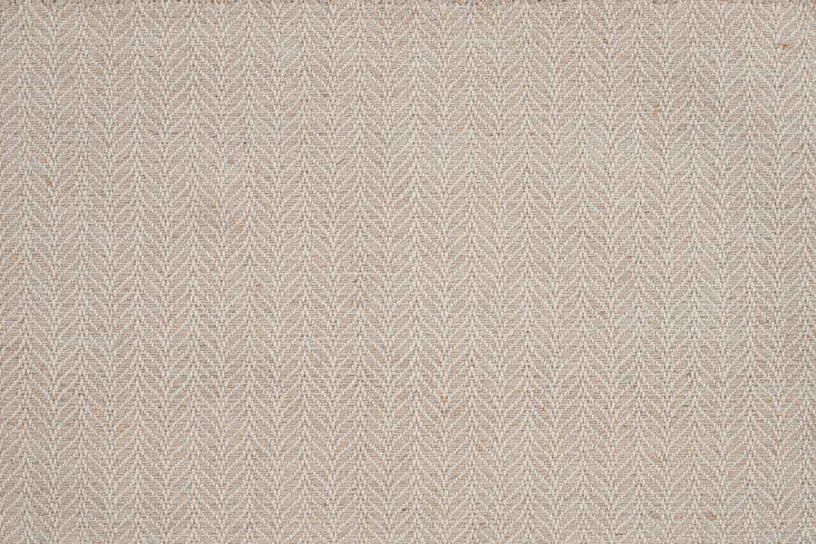 Close-up of the Island Wave On Trend Carpet, a light beige flatweave with a subtle herringbone pattern formed by fine diagonal lines for a textured, geometric look.