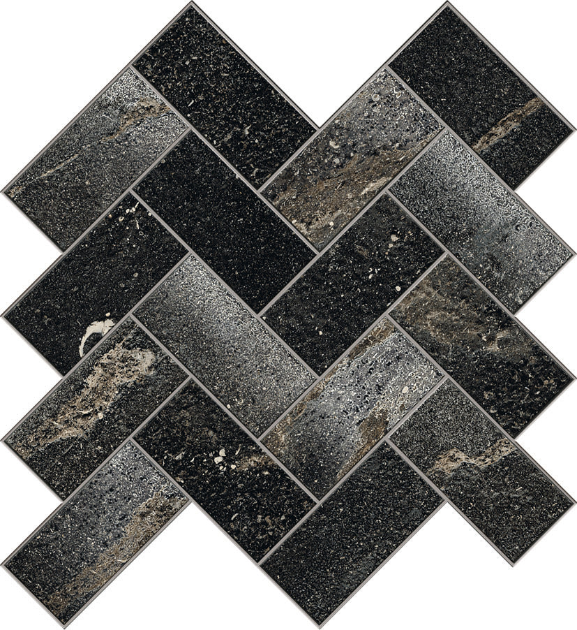 The Ibla Herringbone Mosaic Porcelain Tile features large rectangular tiles with a bold black and dark gray stone texture, arranged in a staggered herringbone pattern for a modern geometric look ideal for luxury interiors.