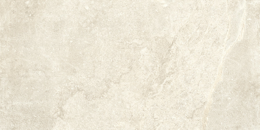 The Ibla 24x48 Large Format Porcelain Tile features a light beige textured stone look with subtle natural patterns, mimicking marble or limestone—perfect for modern luxury interiors with its smooth, earthy appearance and no distinct objects.