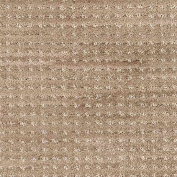 Close-up of Imagine Pet Friendly Carpet in beige, featuring a soft surface with a subtle dotted and striped woven pattern. The handmade look mixes light and slightly darker beige tones for authentic style.