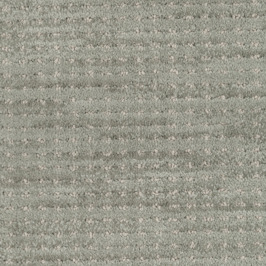 Close-up of the Imagine Pet Friendly Carpet in light gray, featuring a soft, looped pile and subtle, evenly spaced pattern that highlights its authentic textured look.