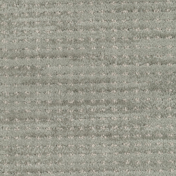 Close-up of the Imagine Pet Friendly Carpet in light gray, featuring a soft, looped pile and subtle, evenly spaced pattern that highlights its authentic textured look.