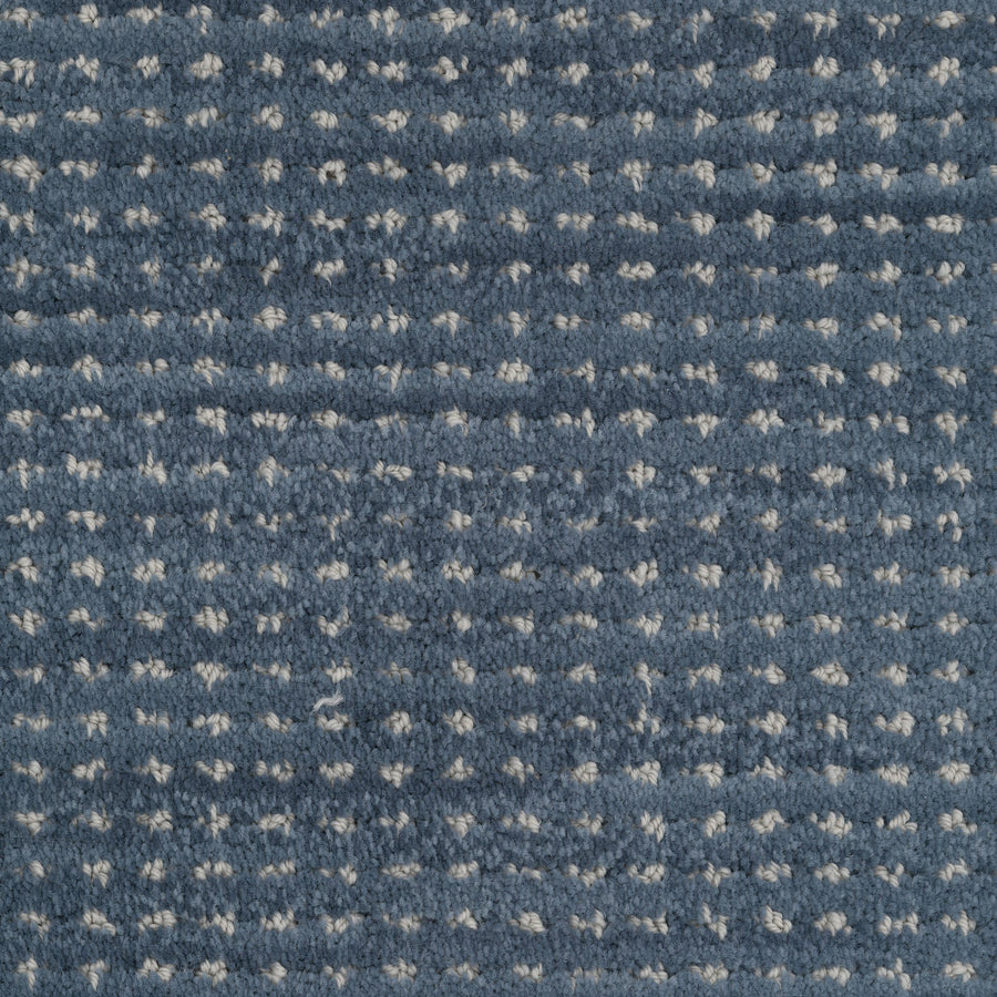 A close-up of Imagine Pet Friendly Carpet highlights its handmade authenticity, showcasing intricate textures and natural fibers.