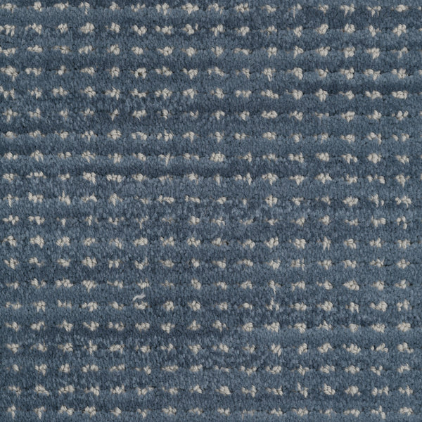 A close-up of Imagine Pet Friendly Carpet highlights its handmade authenticity, showcasing intricate textures and natural fibers.