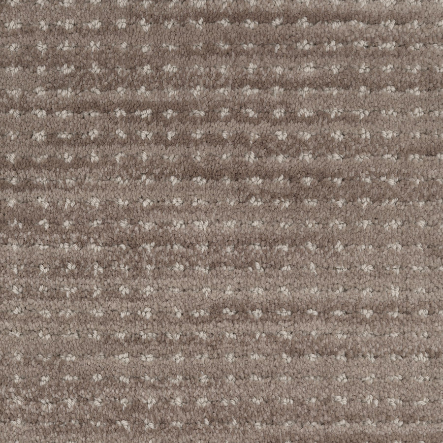 Close-up of Imagine Pet Friendly Carpet, showcasing its textured brown wool surface with a subtle grid pattern and evenly spaced lighter dots, emphasizing its handmade look.