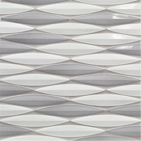 The Ka-Nu Keel 3D Mosaic Tile features elongated, diamond-shaped ceramic tiles in glossy white and light gray glazes, arranged horizontally for a modern look with a textured, three-dimensional effect.