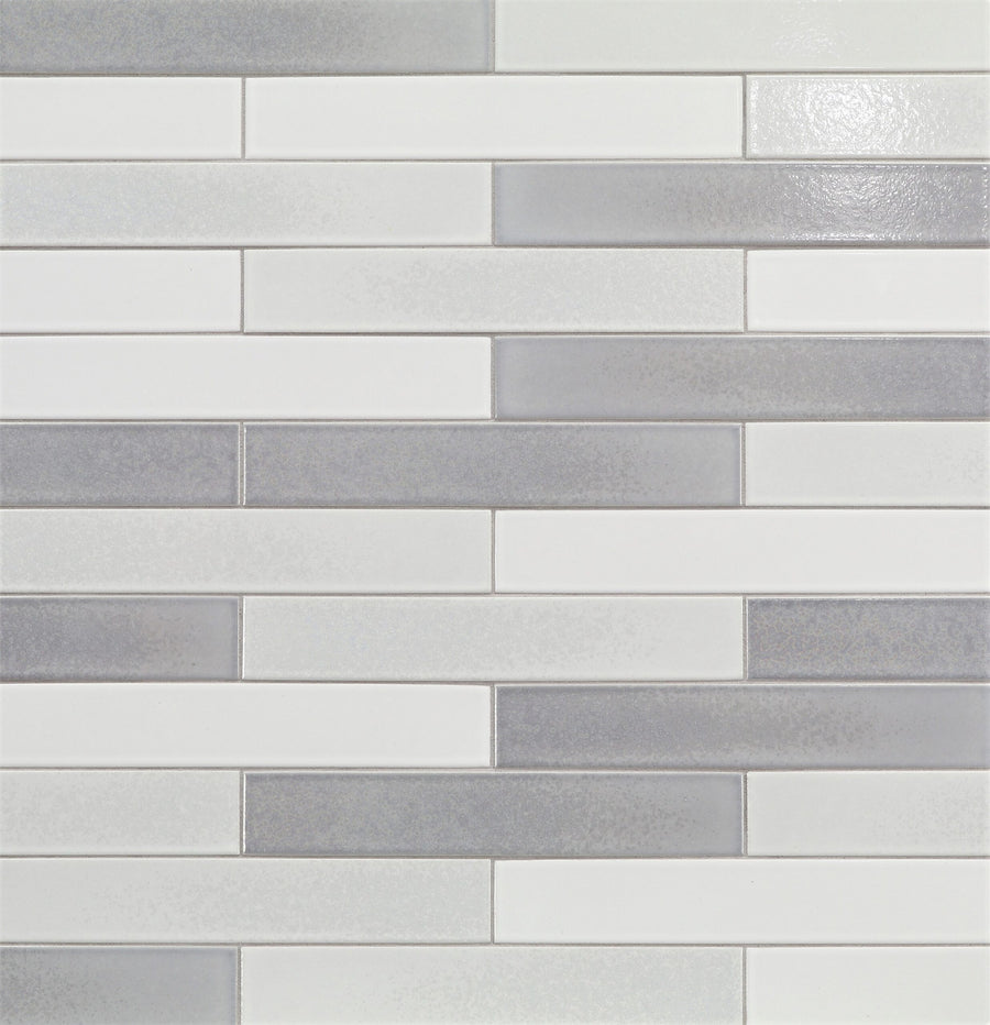 Ka-Nu 1 5/8 x 9 1/2" Plank Ceramic Tiles in white and gray are installed horizontally in a staggered brick pattern, giving a modern, clean geometric look.