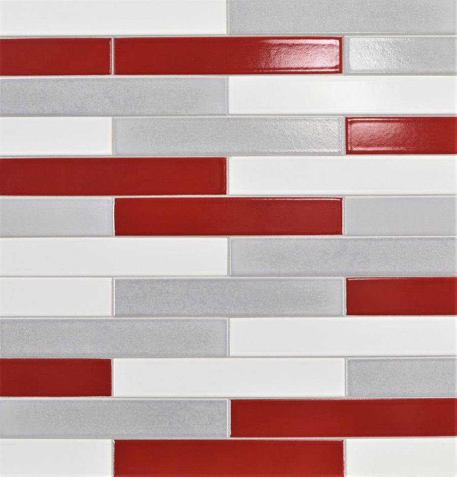 Ka-Nu 1 5/8 x 9 1/2" Plank Ceramic Tiles in red, white, and light gray are arranged horizontally in a brick pattern. The glossy finish and vibrant colors give any space a modern, clean look.