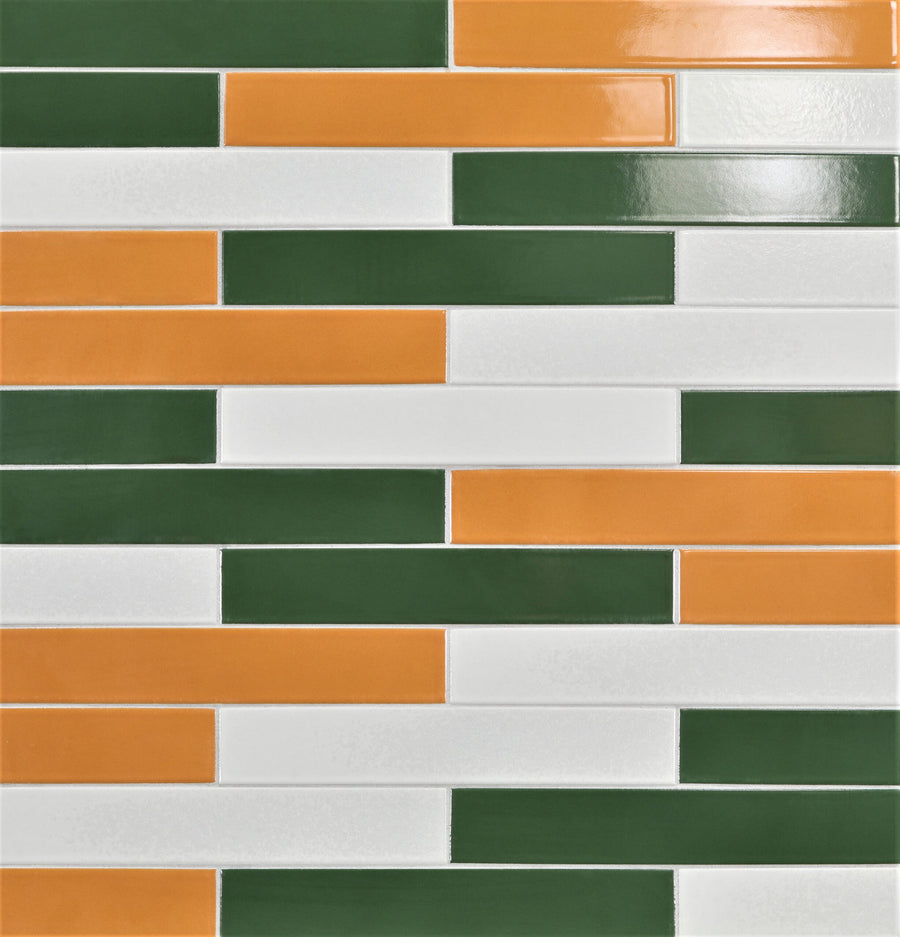 Ka-Nu 1 5/8 x 9 1/2" Plank Ceramic Tile in green, orange, and white is arranged in a staggered brick pattern, producing a vibrant and colorful geometric look.