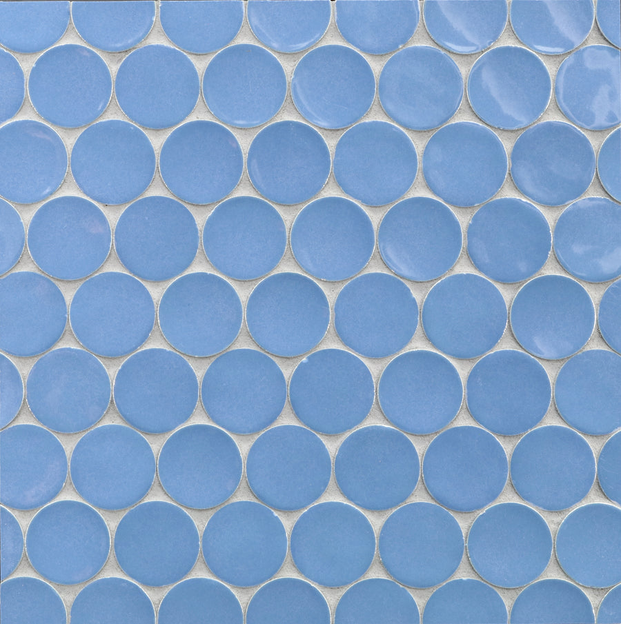 Ka-Nu Buoy 2" Pennyround Mosaic Tile features evenly spaced, round blue ceramic tiles with white grout lines arranged in a grid on a flat surface.