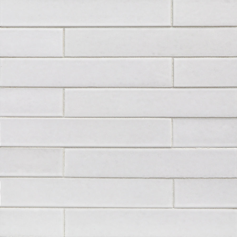 Ka-Nu 1 5/8 x 9 1/2" Plank Ceramic Tiles in a horizontal, staggered brick pattern deliver a clean, simple wall surface.