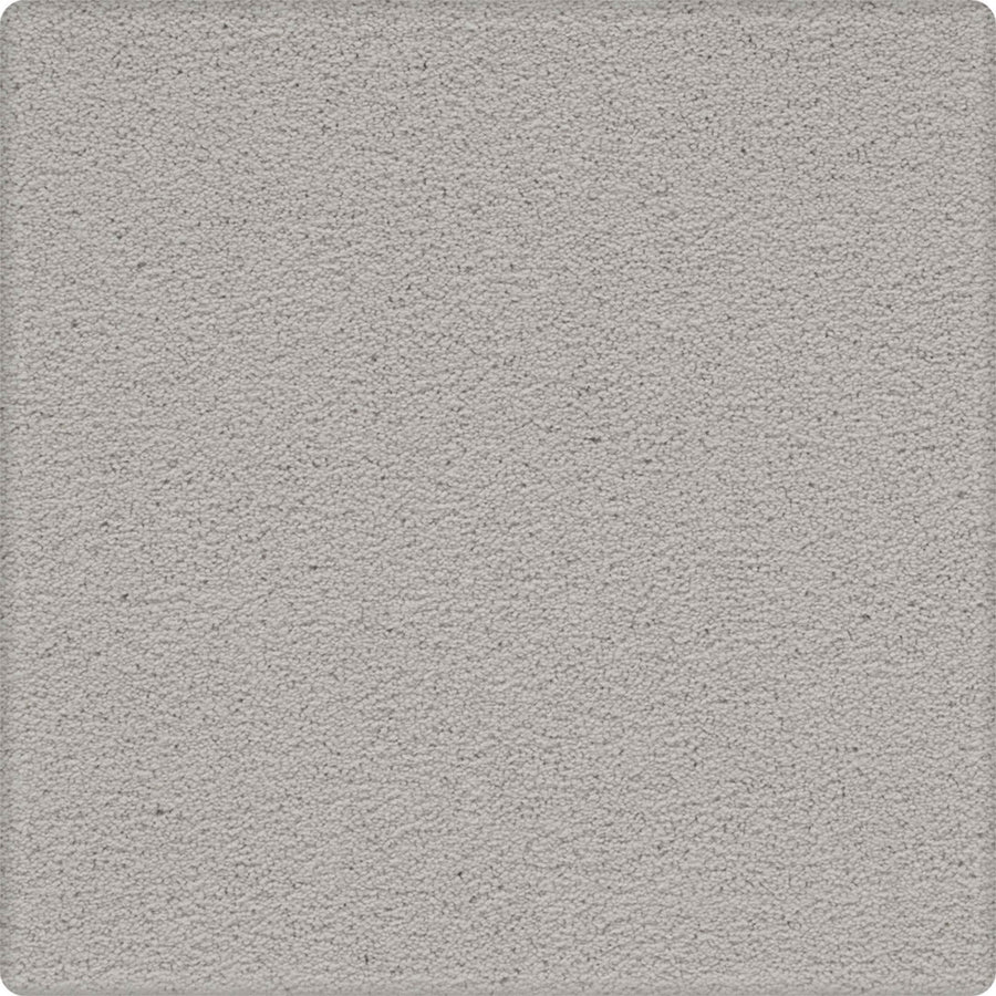 A close-up view of Dynamic Display Family Friendly Carpet shows its textured gray surface with a slightly rough, grainy finish and rounded corners—an easy-care, durable choice perfect for stylish family spaces.