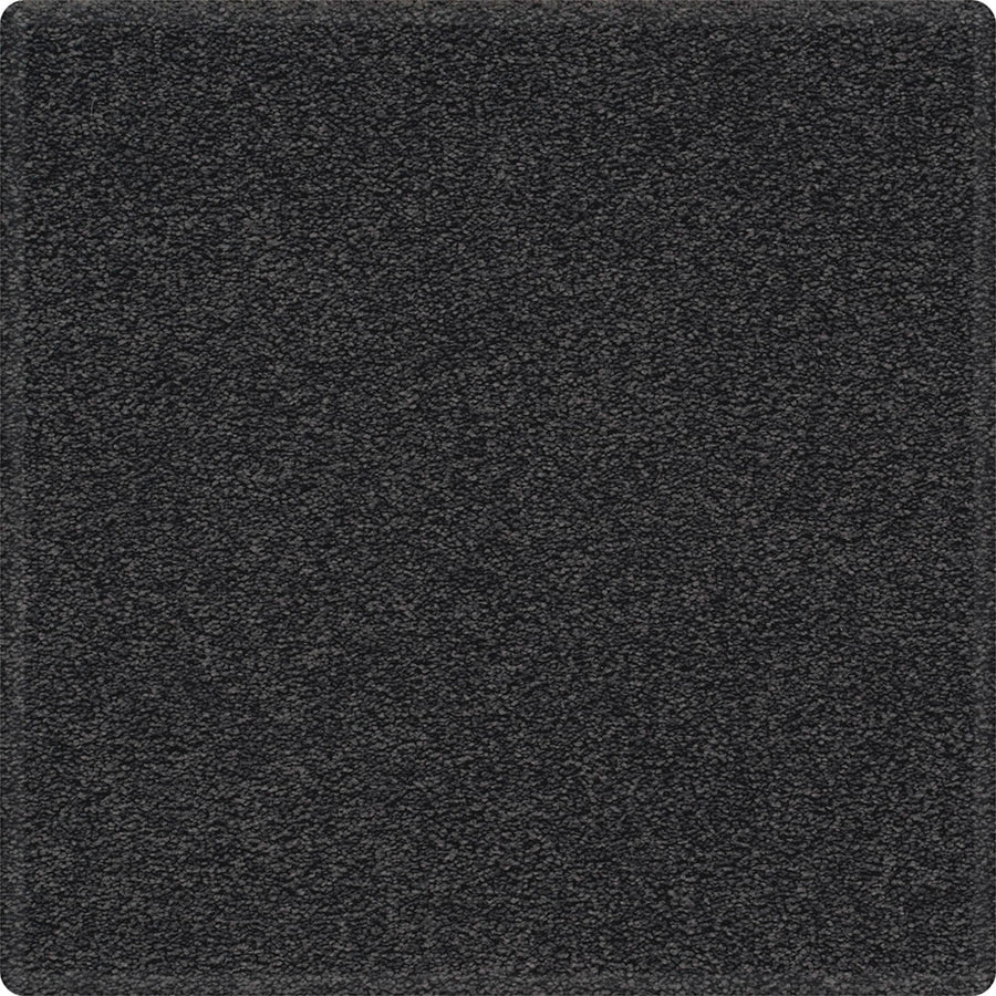 A close-up of the Dynamic Display Family Friendly Carpet reveals a square, dark gray plush texture with slightly rounded corners and easy-care durability—perfect for any decorator’s dream.