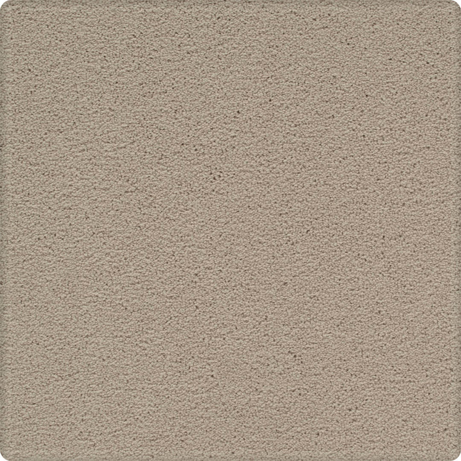 A close-up of Dynamic Display Family Friendly Carpet shows its square, light brown textured surface with rounded corners and a consistent pattern—easy-care durability makes it a decorator's dream.