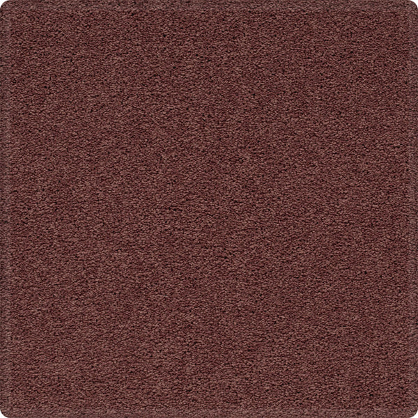 A close-up of the Dynamic Display Family Friendly Carpet, a rectangular, reddish-brown soft carpet with a textured surface and rounded corners—an easy-care, durable choice for any decor.