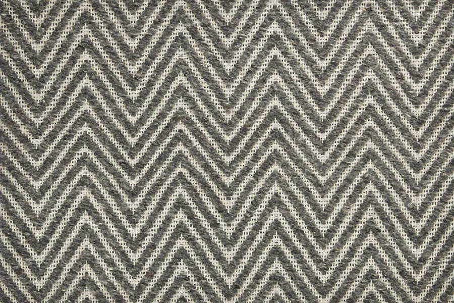 Close-up of the Kauai On Trend Carpet, showcasing a black and white zigzag chevron pattern reminiscent of textured, geometric flatweave rug designs.