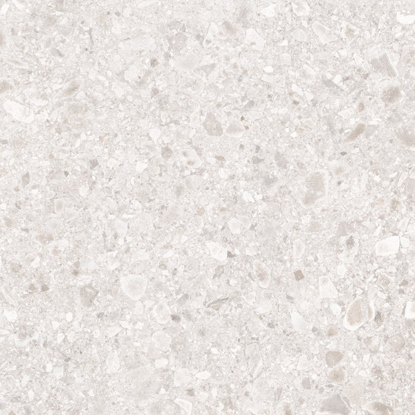 The Amalfi 32x32 Porcelain Tile features a light beige terrazzo look with small to medium stone and marble fragments in a polished finish, ideal for luxury interiors with its elegant speckled, textured stone-effect surface.