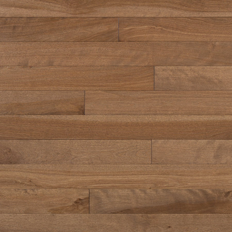A close-up of Lafayette 3 1/4" Birch Hardwood showcases its natural wood grain, knots, and warm brown tones in a horizontal layout—ideal for anyone seeking elegant flooring.