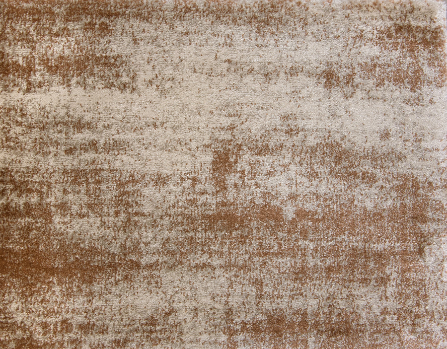 The Landscape On Trend Carpet is a beige and light brown area rug with a distressed abstract pattern, custom finished for an uneven color blend that creates a stylish vintage, worn look.