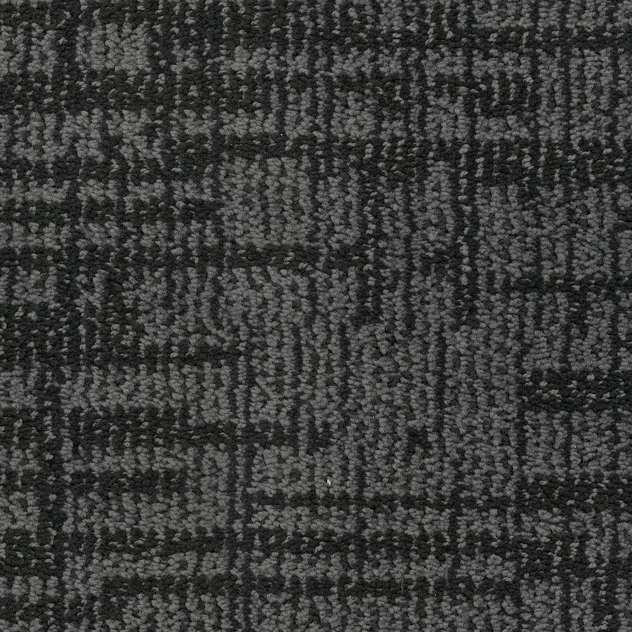 Close-up of Lineage Pet Friendly Carpet in dark gray, crafted with EnVisionSD yarn and a subtle geometric grid pattern in varying gray shades for a modern, textured flooring look.