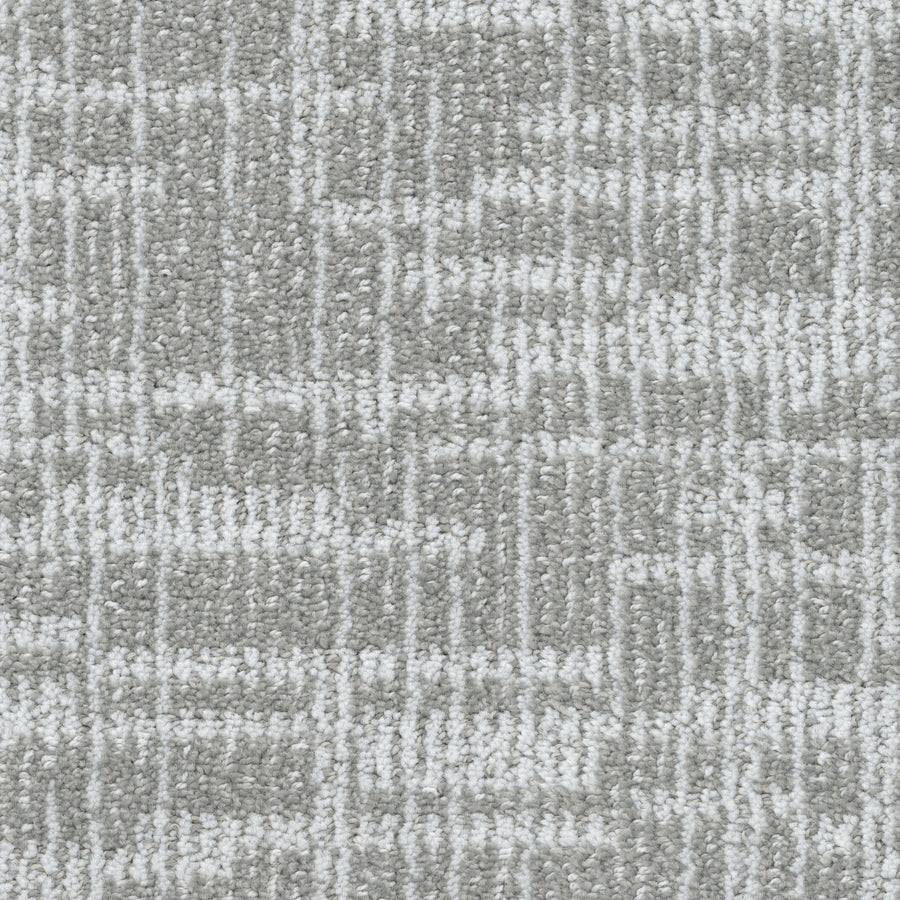 Close-up of Lineage Pet Friendly Carpet in light grey, crafted from EnVisionSD yarn with a textured geometric grid of intersecting lines and rectangles—an ideal modern choice for stylish, contemporary floors.