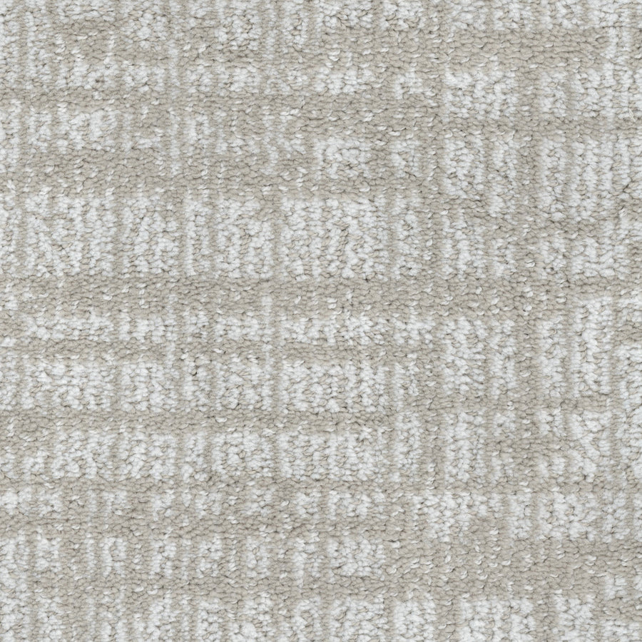 Close-up of Lineage Pet Friendly Carpet in light beige, featuring a subtle geometric square and rectangle pattern. Crafted from EnVisionSD solution-dyed fibers for a soft feel and lasting style in a clean, modern neutral palette.