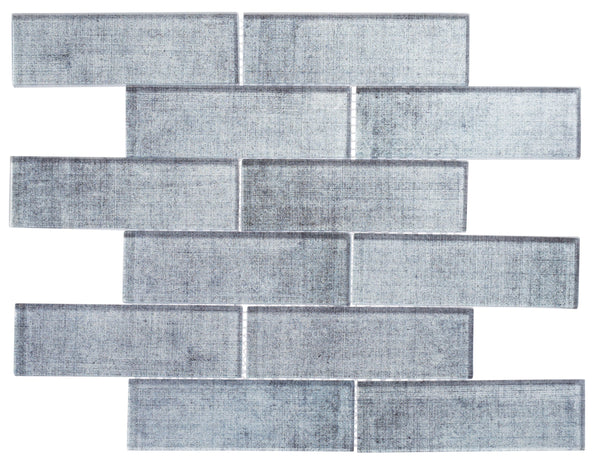 A close-up of Westminster Glass Mosaic showcases its textured surface—ideal inspiration for a distinctive backsplash or shower tile design.